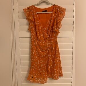 Mango dress perfect for Thanksgiving events. Length is just above the knee.